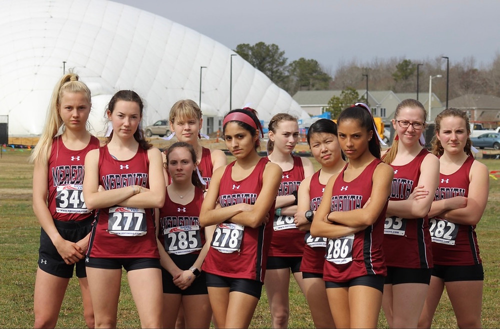 The Meredith Cross Country Team standing together