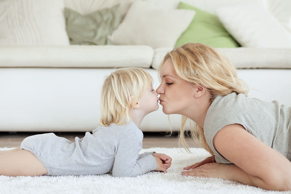 Happy mom and child on a clean Lily's Correct Carpet & Oriental Rug