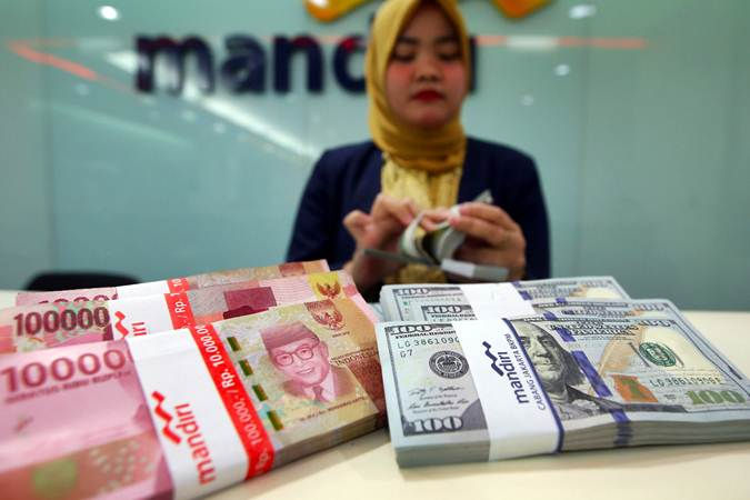 Solid Gold Berjangka | Rupiah Selasa Pagi Rebound ke Rp14.055/USD