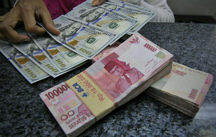 Solid Gold Berjangka | Rupiah Rabu Siang Melemah ke Rp. 13.930/USD