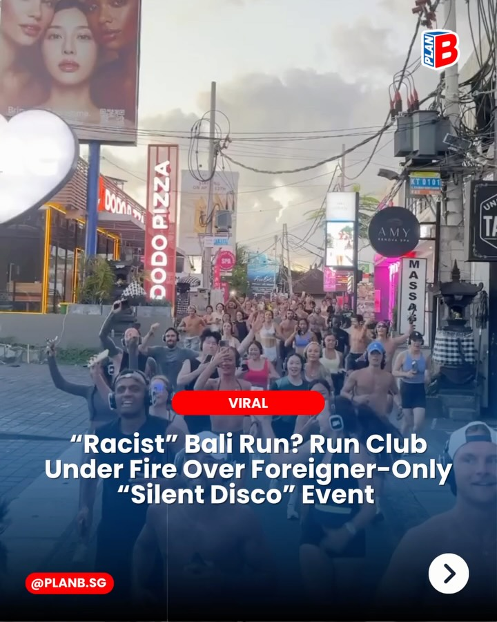Crowd of runners on a Bali street past neon signs, with headline about a foreigner-only silent disco event and PLAN B branding.