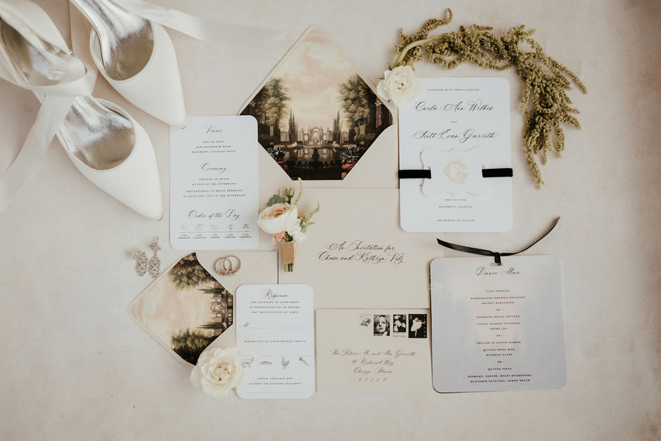 custom Ohio wedding invitation suite in a styled flatlay with bride's accessories