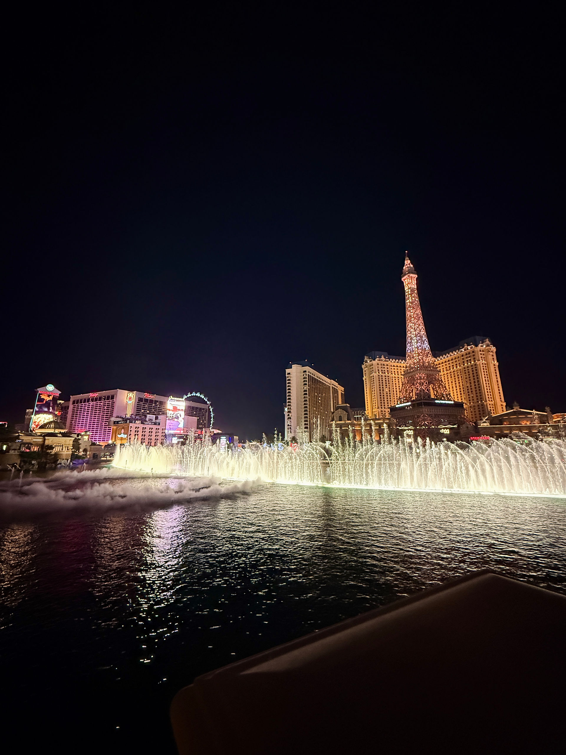 Bellagio Fountains and View of Paris Hotel