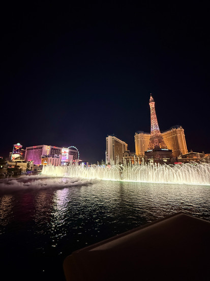 Bellagio Fountains and View of Paris Hotel
