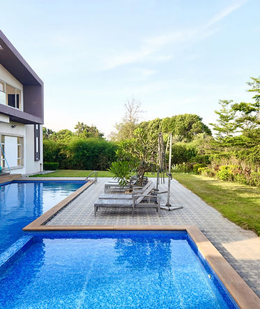 Luxurious tropical themed outdoor swimming pool_edited.jpg