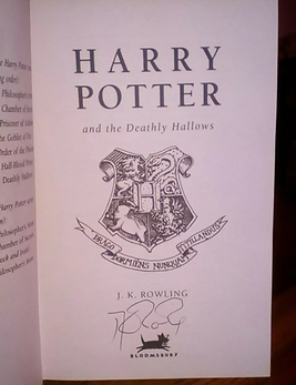 Fake/forged JK Rowling signatue found inside of a Harry Potter and the Deathly Hallows; sold by ebay seller Gold124gnu.