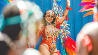 Masquerader in YUMA Carnival costume on the Trinidad Carnival 2027 parade route