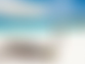 Aerial view of a luxury Caribbean all-inclusive resort with turquoise water and beach access