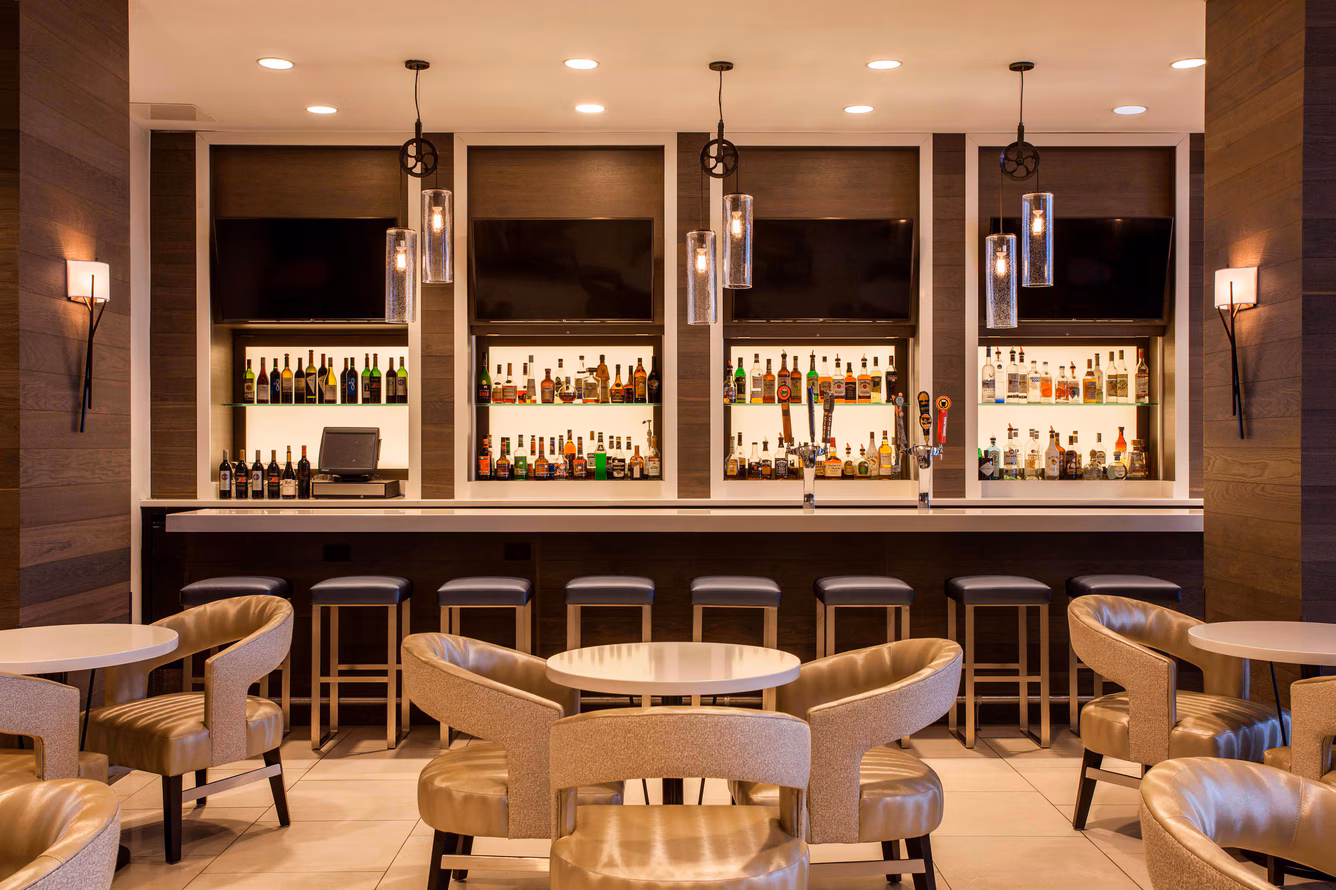 Social space at Sheraton Norfolk Waterside Hotel—venue for 2026 SCSUNAA National Convention secured by Limin Professionals