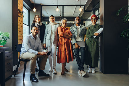 group of diverse entrepreneurs standing together proudly