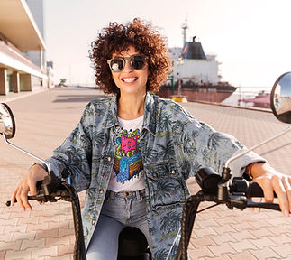 happy-curly-woman-sunglasses-rides-moder