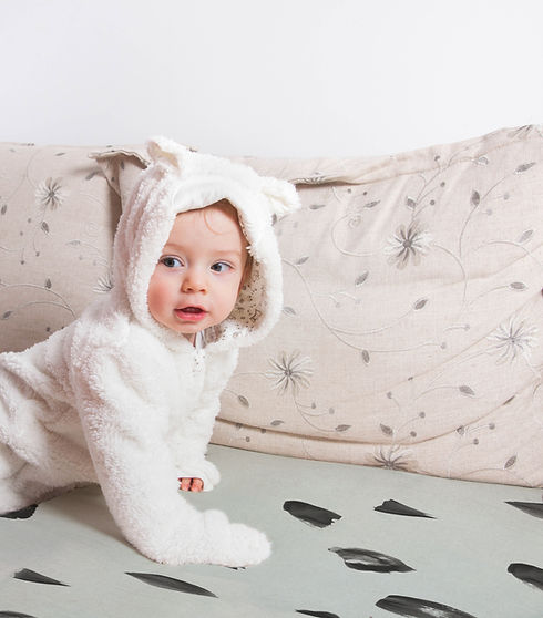 Baby on a Bed
