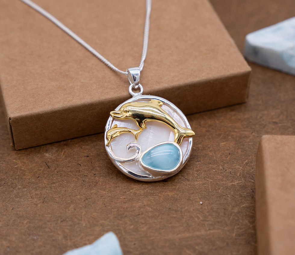 Thumbnail: Silver and Gold Dolphin Necklace with Larimar, Sea Life Seashell Background