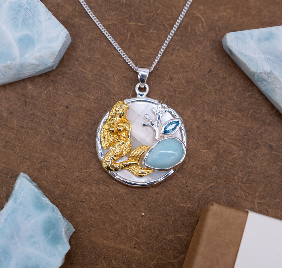 Thumbnail: Gold Mermaid Necklace with Larimar and Blue Topaz, Silver Seashell Background