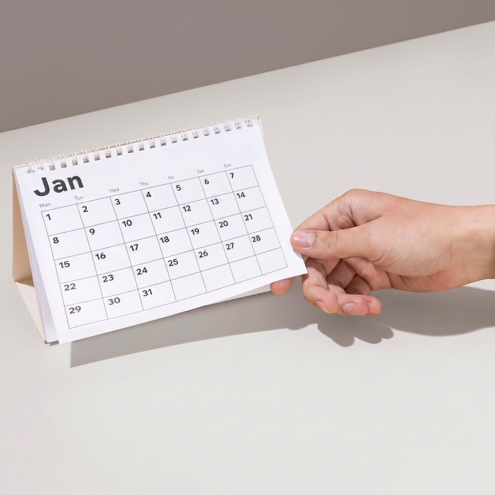 Hand Holding Calendar