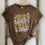 Thumbnail: With Jesus In Her Heart - Women’s Relaxed Tri-Blend Short Sleeve Crew T-Shirt