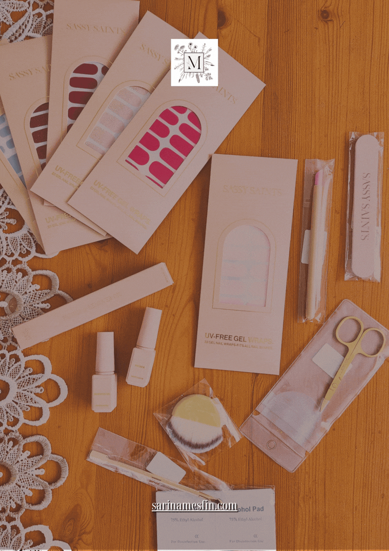 Nail care items and pink gel wraps on a wooden table with lace. Includes scissors, a makeup brush, and text: "sarinamesfin.com".