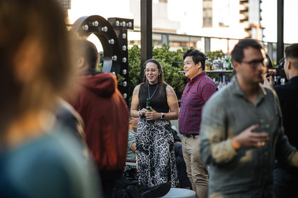 qt rooftop melbourne christmas corporate event with restive consulting