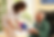 caregiver helping a senior male patient at home