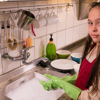 girl washing plate