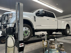 Ford F450 on Wildfire 12000lb Truck Lift with 6000lb Air Jack