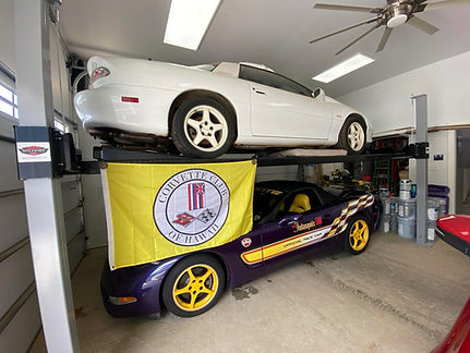 Camaro and Corvette on Wildfire Lift in Hawaii.jpg