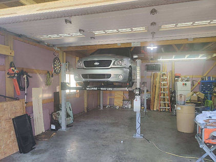 Ford Lightning on Wildfire Lifts WF9000.jpg