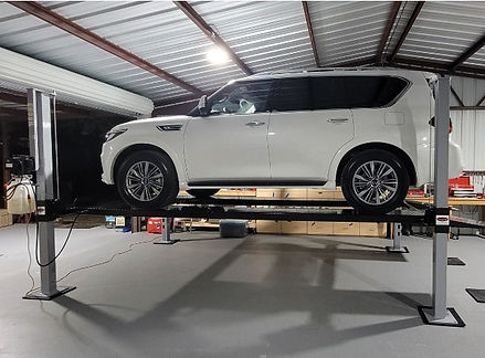 Infiniti QX80 on Wildfire Lift.jpg