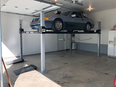 WF9000 4 Post Car Lift with Mercedes.JPG