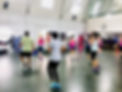 people-at-gym-lunchtime-zumba-class-in-t