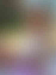 Stylish tween girl in a pink skirt, white top, and personalized BaubleBar jewelry.