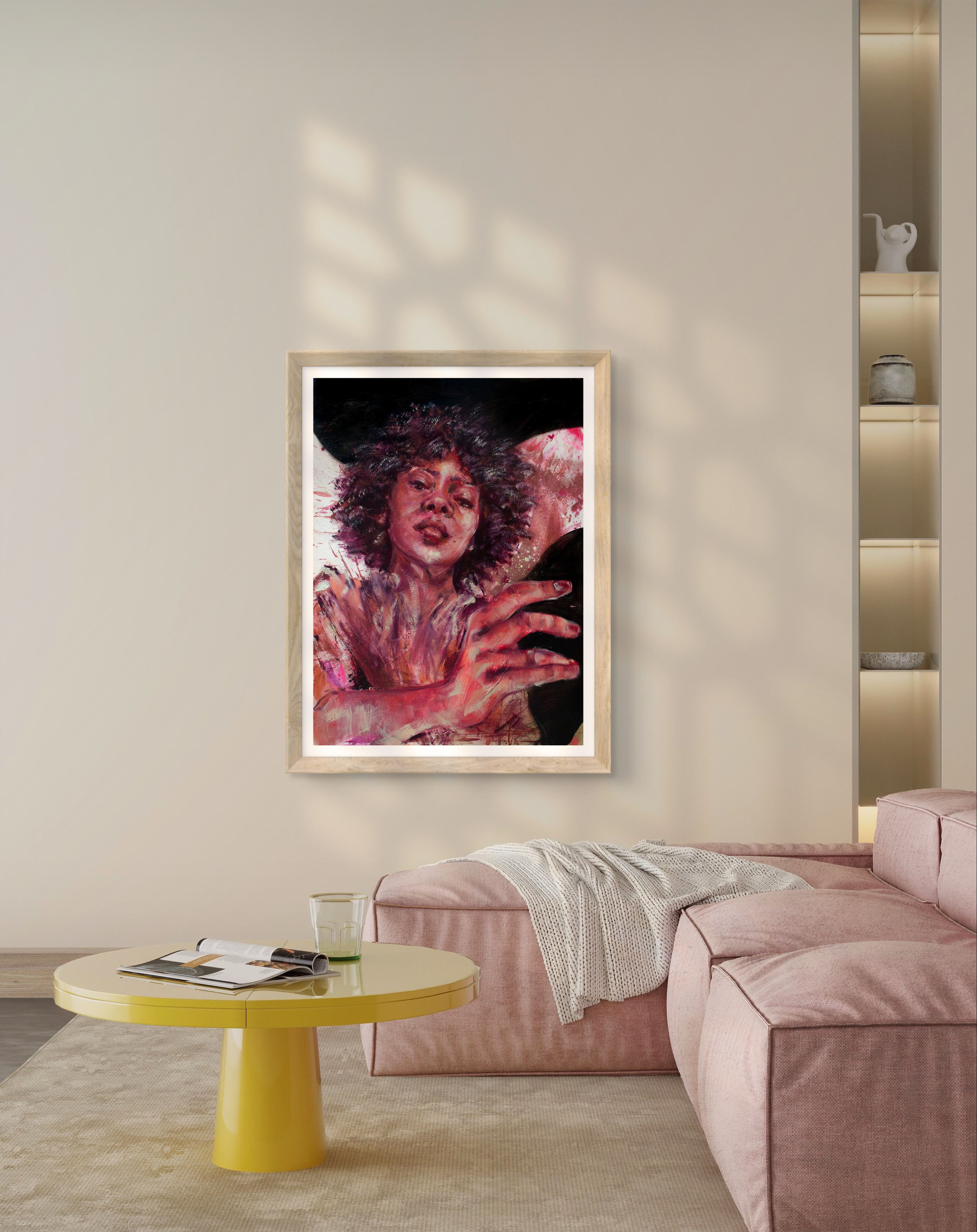 Large framed print of a black woman reaching out with her hand. Decorating a minimalist modern colourful home
