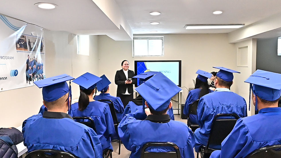 Eye-level view of a classroom with students practicing caregiving techniques