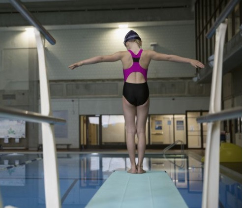 Thumbnail: The first jumps into the water with toes pointed