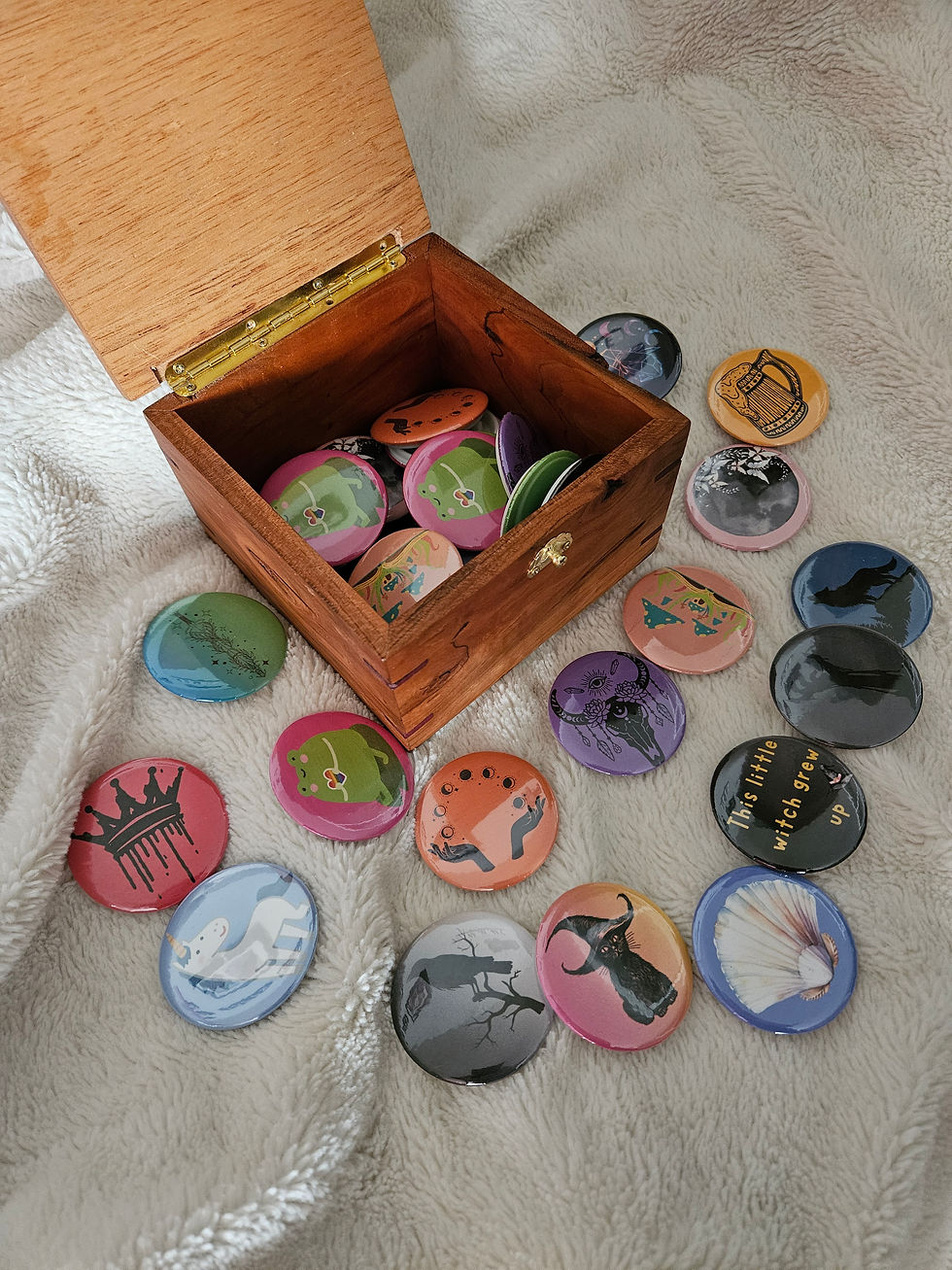 My Father-in-law made this box for me, I thought it'd be a neat thing to put my buttons in!
