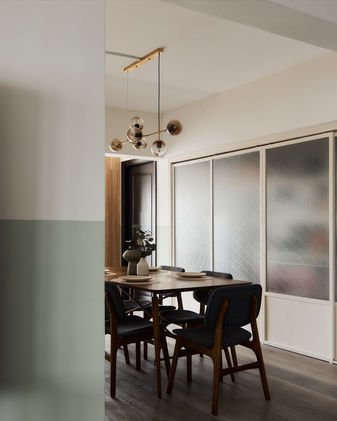 Bright dining area with natural lighting, mid century wooden furniture, and classic retro design
Mid century inspired dining room with warm light, bamboo-style furniture, and elegant retro vibe