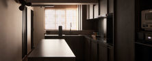 Moody Modern Oriental kitchen layout featuring an island prep counter dark cabinetry and natural daylight from window blinds.