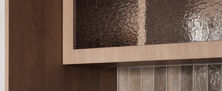 Japandi coffee nook with textured fluted glass upper cabinet textured wall tiles and sleek water dispenser.