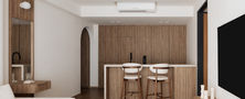 Bright Scandinavian open-concept living space featuring herringbone wood flooring, warm timber kitchen island bar, and arch doorway transition by Intheory Design Singapore.
