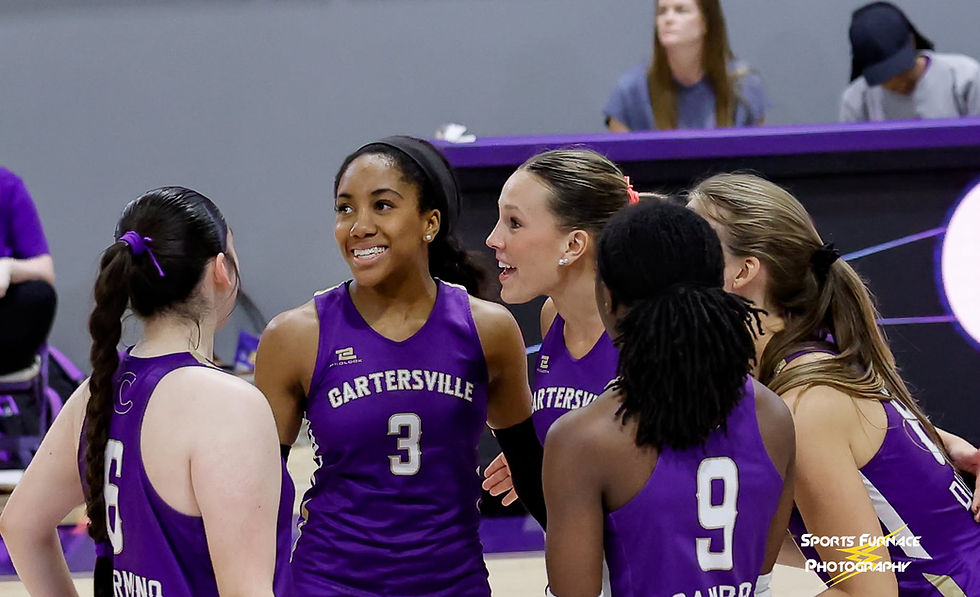 The Lady Canes are all smiles after a winning point. Photo: Russell Andrews