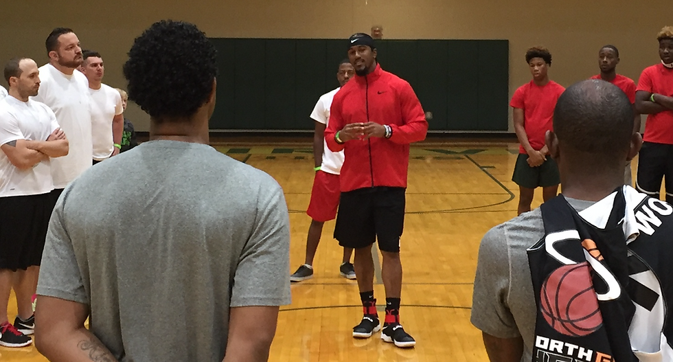 Vic Beasley, Jr. speaking to group at FCA tourney