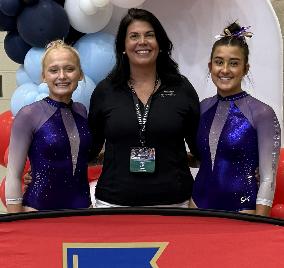 Ellie Kate Jones, coach Kimberly Mostellar, and Emerie Elrod at the GHSA State Preliminary Meet in Buford on Wednesday.