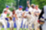 Gianni Gandy and his Cartersville teammates celebrate following his walkoff hit to win the Canes' state quarterfinal series versus St. Pius X Catholic.