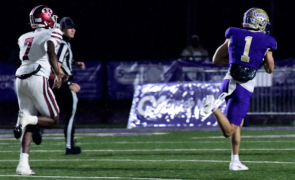 Brady Marchese sprints to the end zone for a 55-yard score in the Canes' win over Warner Robins on Nov. 21. RANDY PARKER / DTN