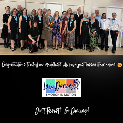 Group of people with their exam medals