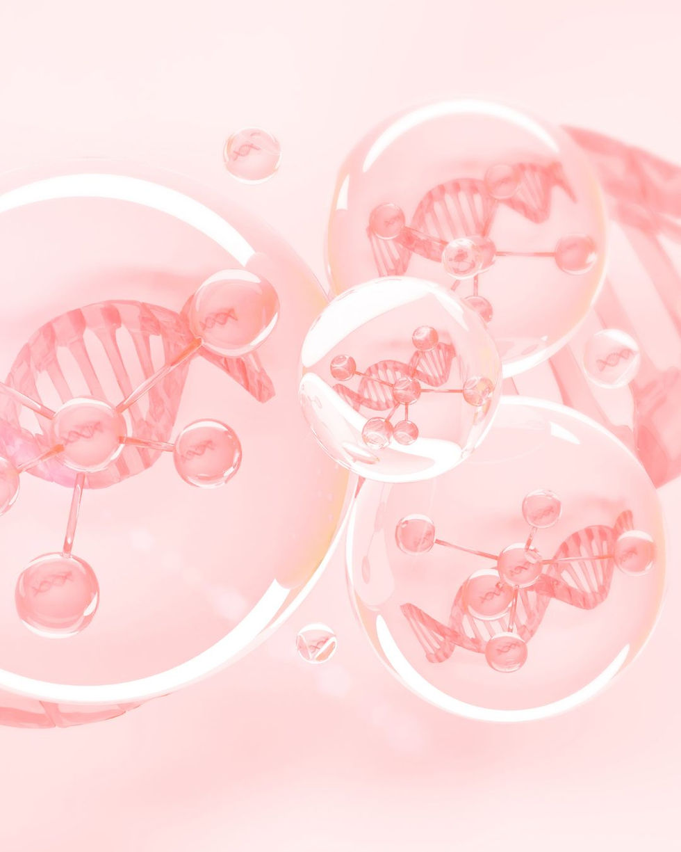 Polynucleotide helix patterns inside transparent spheres on a soft pink background. Light reflections enhance the futuristic and serene atmosphere, with delicate details highlighting the molecular strands.