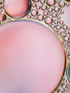 Woman with blonde hair shown in a side-by-side comparison. Neutral expression, bathroom setting, warm lighting.