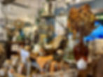 Sterling & Maple autumn-themed decor display with pumpkins, lanterns, and seasonal wreaths.