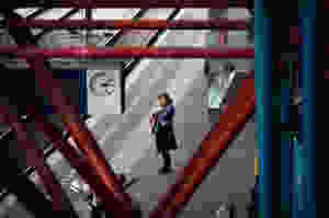woman waiting for a train