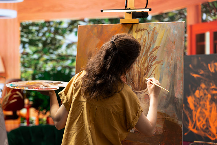 painter-spends-quality-time-her-studio-creating-masterpiece.jpg